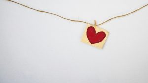 heart-shaped red and white pendent